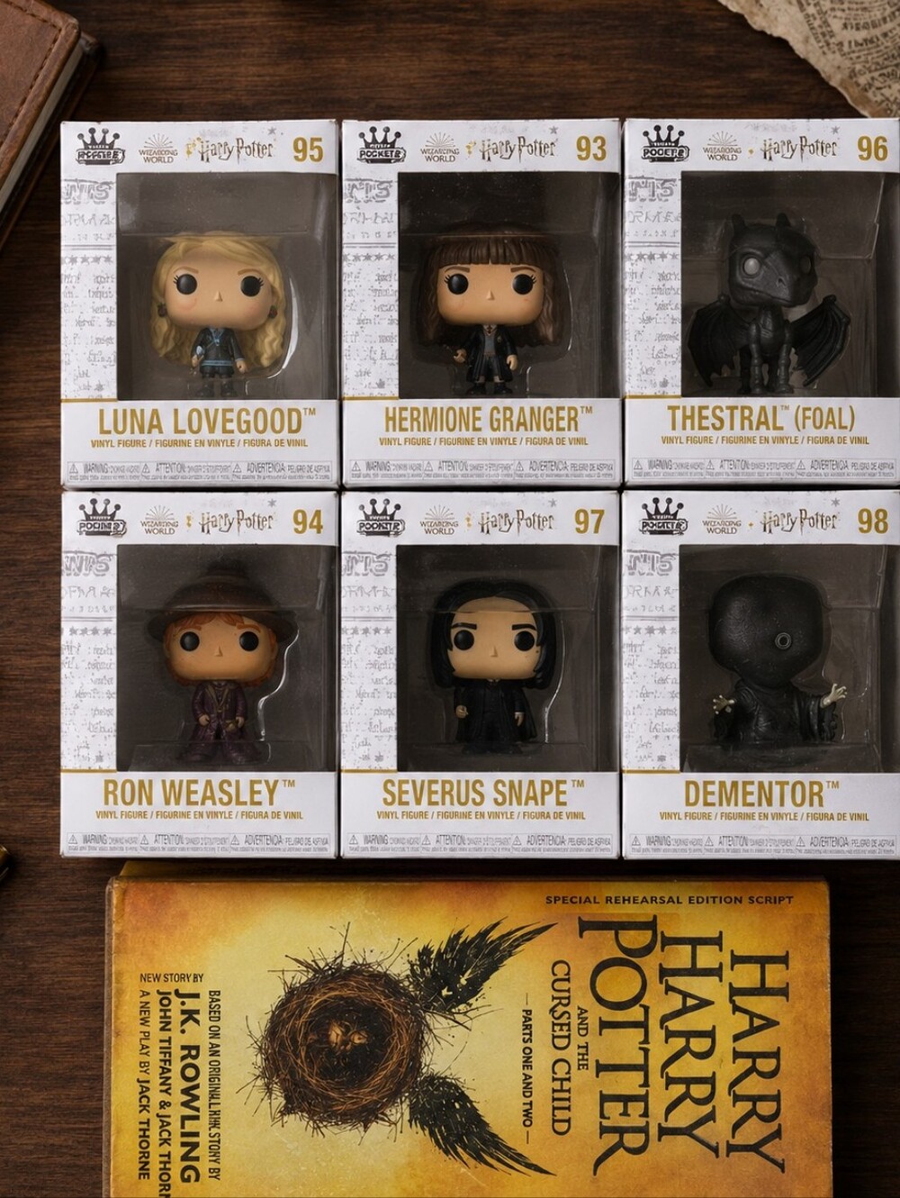 Six Harry Potter Funko Minis With The Harry Potter And The Cursed Child Book
